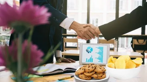 Modern office pantry stocked with healthy snacks and beverages for corporate clients